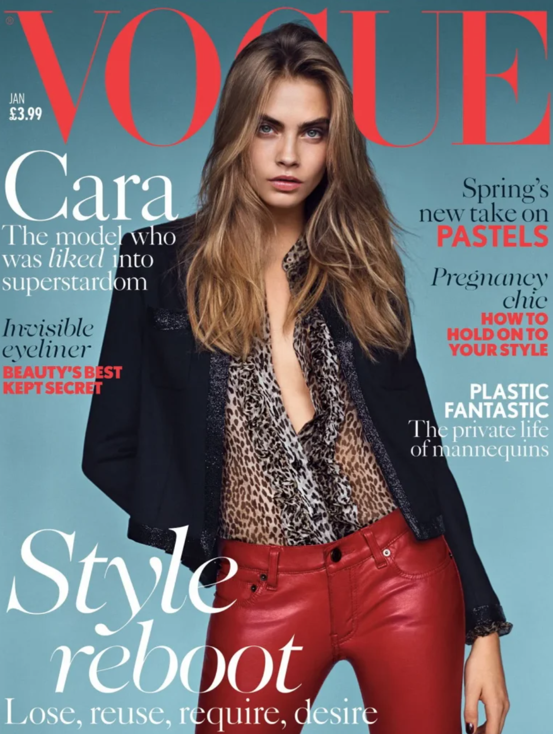 Cara Delevingne standing center on the cover, against a light blue background with large VOGUE text in red behind her head